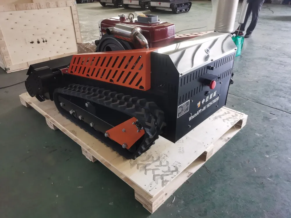 Rear view of the tracked mower chassis and engine, positioned on the pallet ready for packing